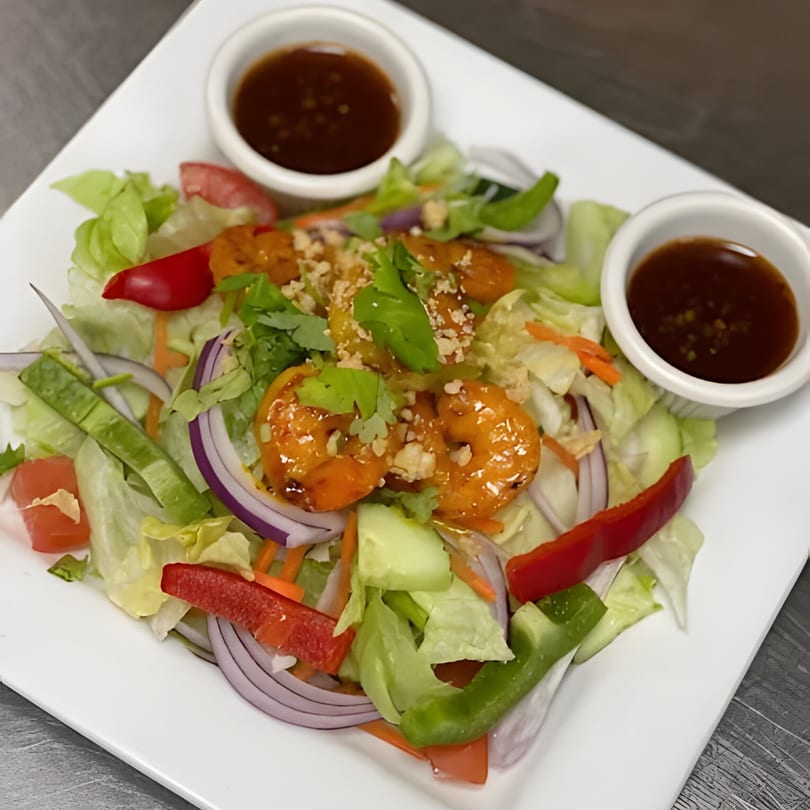 Thai Cafe's shrimp salad with fresh vegetables, peanuts, cilantro, and two dipping sauces.